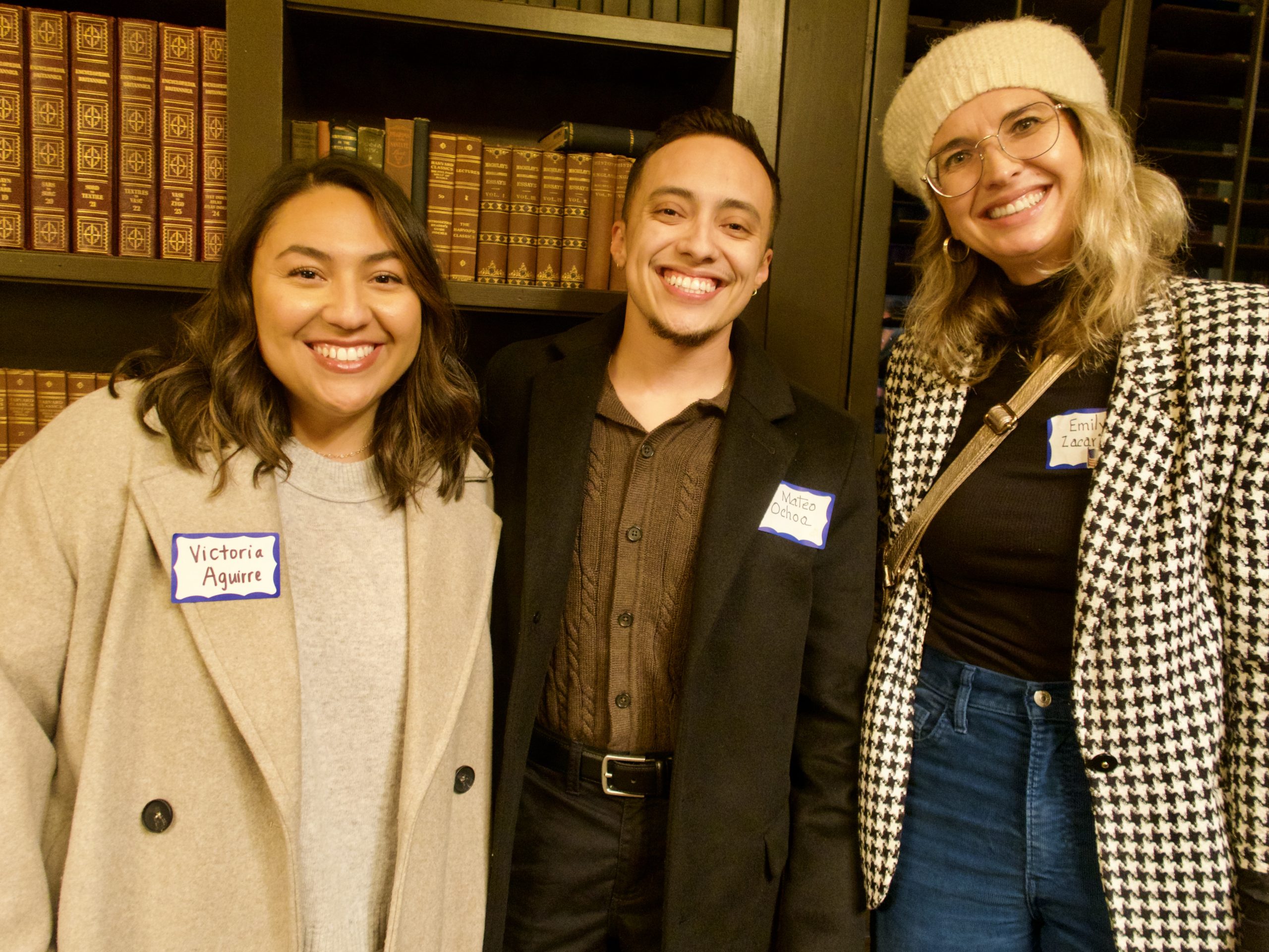 People smiling at the Cosmopolitics 2025 event