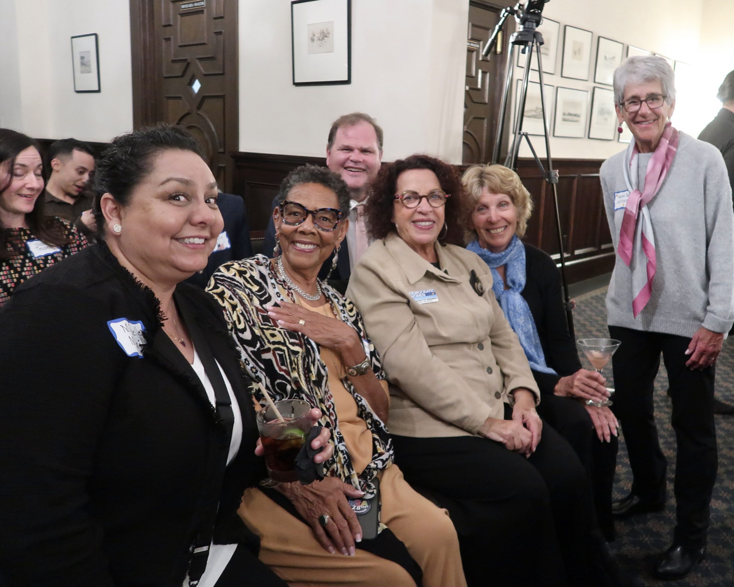 People smiling at the Cosmopolitics 2025 event