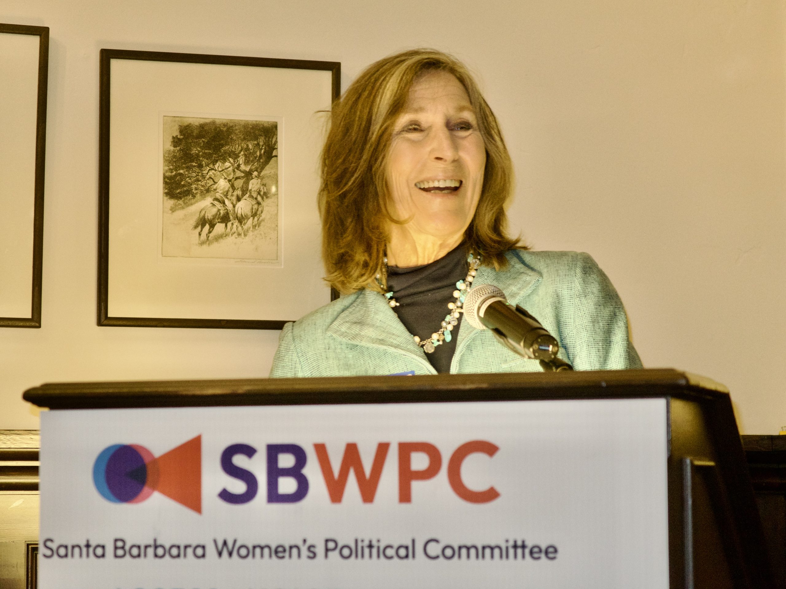 Person speaking at the Cosmopolitics 2025 event