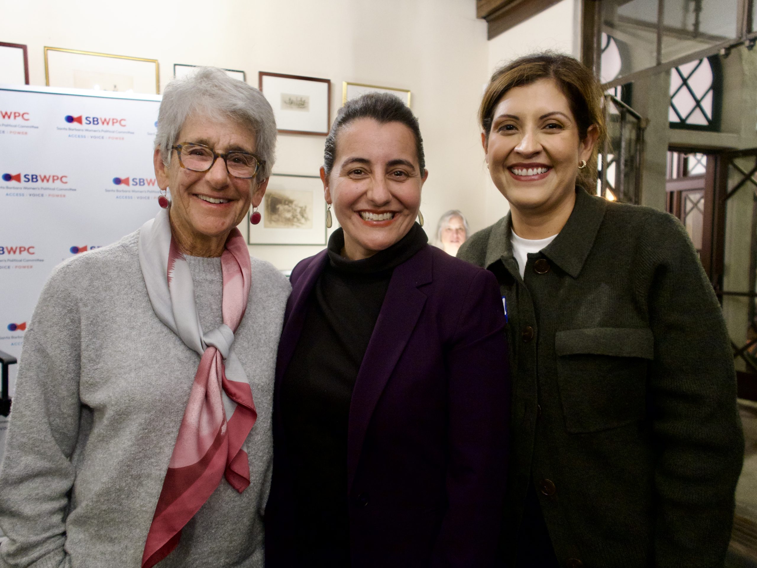 People smiling at Cosmopolitics 2025