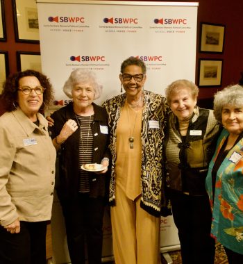 People smiling at Cosmopolitics 2025