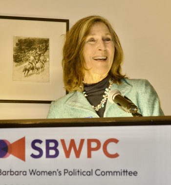 Person speaking at the Cosmopolitics 2025 event