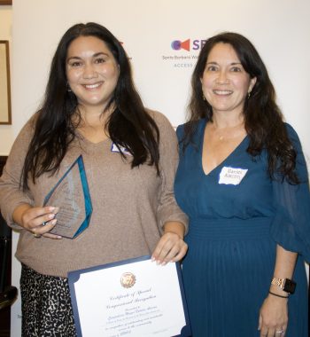 People smiling at the Cosmopolitics 2025 event